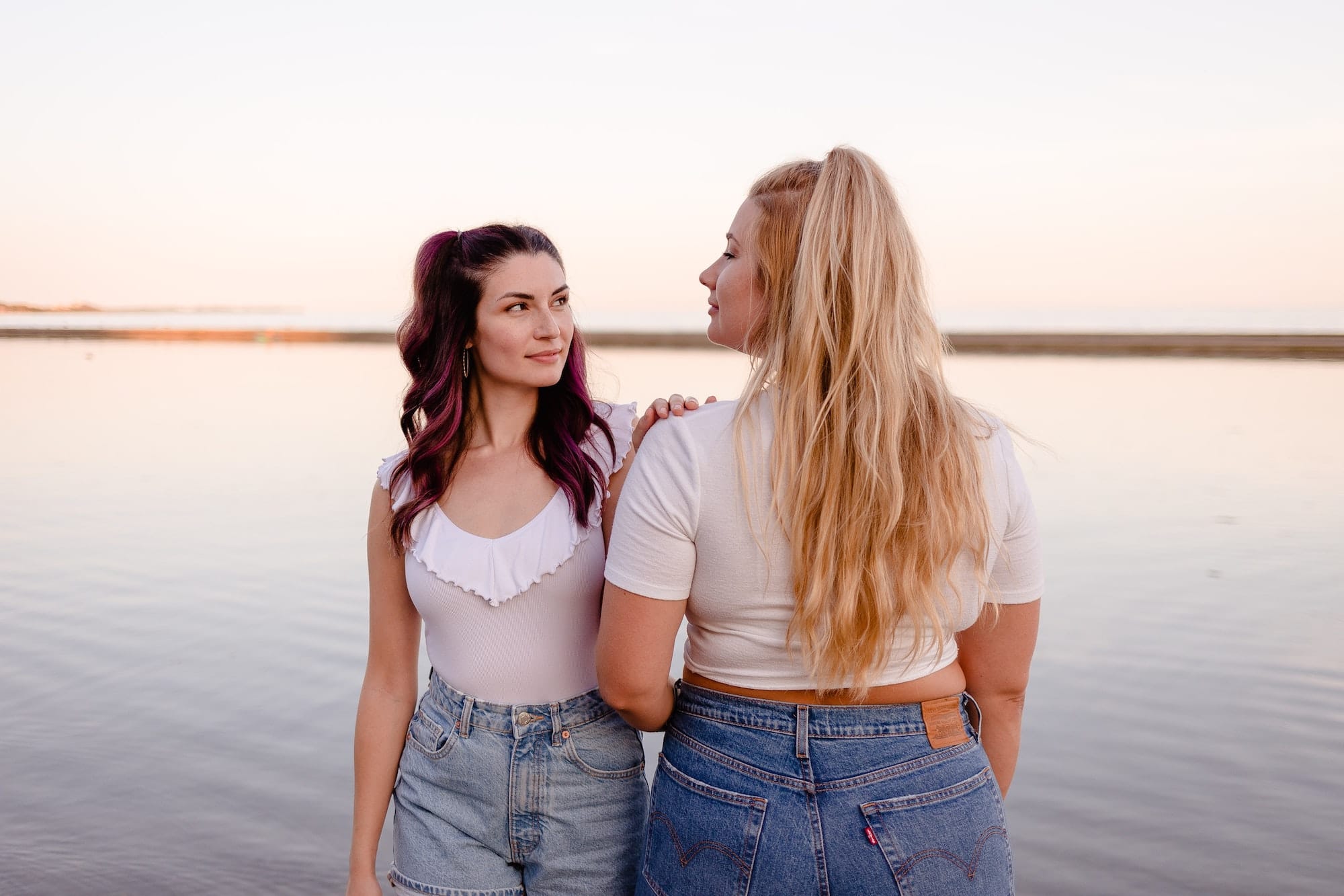 two women with matching outfits